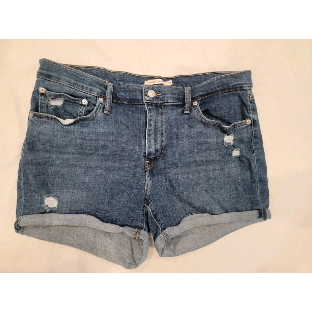 Levi's denim jean stretch shorts: Mid Length, Distressed, Medium Wash Women's 33